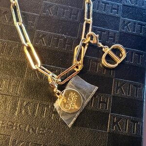 Dior Beauty Gold Tone Bag Charm or charm bracelet w/ 6 moveable Charms